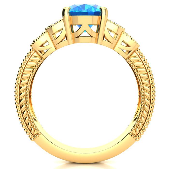2 1/3 Carat Oval Shape Blue Topaz and Diamond Ring In 10 Karat Yellow Gold