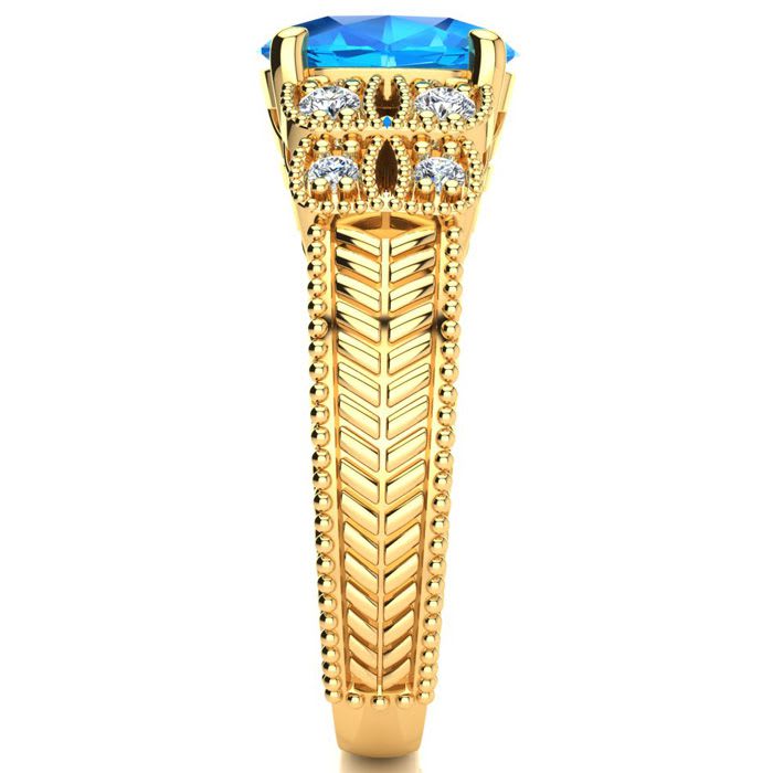 2 1/3 Carat Oval Shape Blue Topaz and Diamond Ring In 10 Karat Yellow Gold