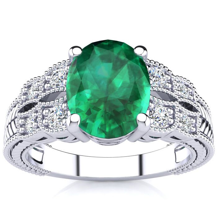 2 Carat Oval Shape Emerald and Diamond Ring In 10 Karat White Gold