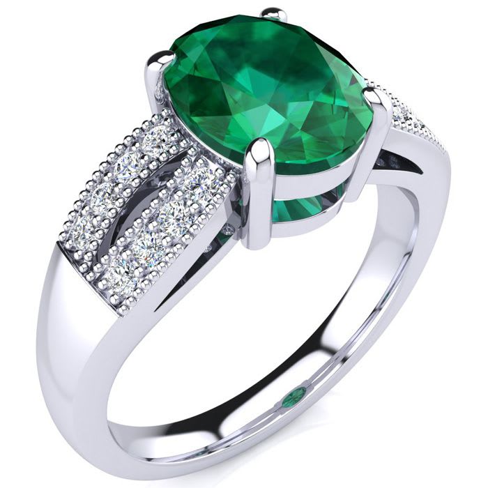 2 Carat Oval Shape Emerald and Diamond Ring In 14 Karat White Gold