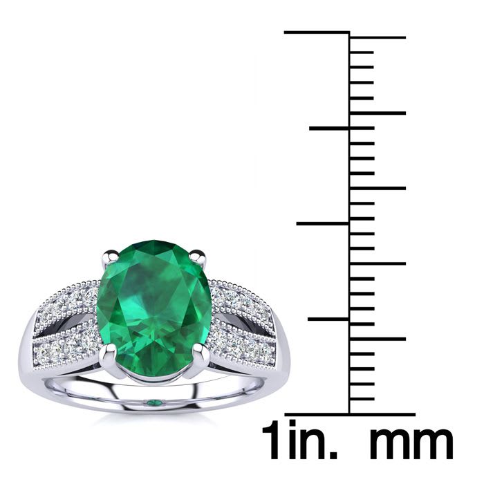 2 Carat Oval Shape Emerald and Diamond Ring In 14 Karat White Gold