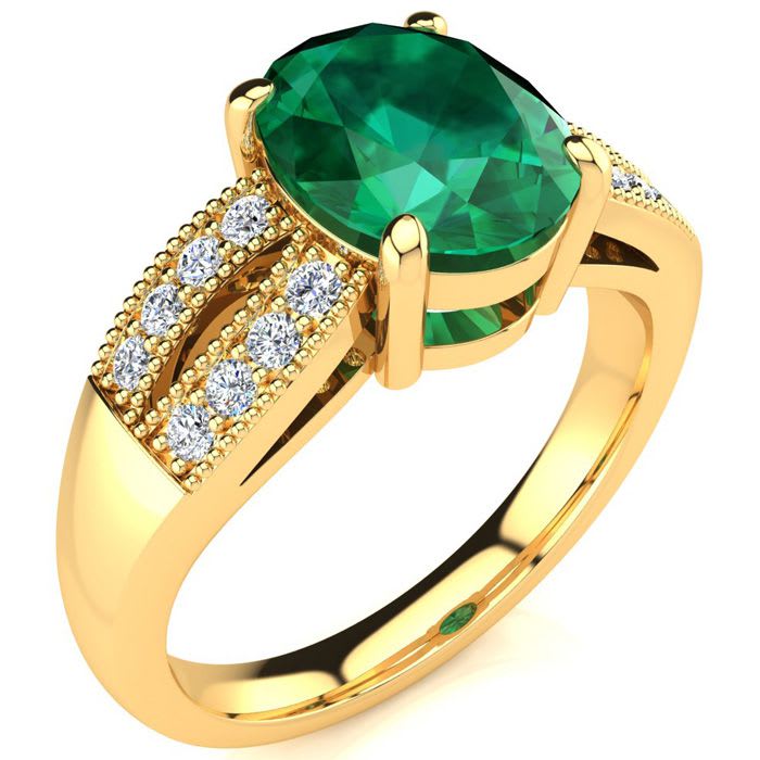 2 Carat Oval Shape Emerald and Diamond Ring In 14 Karat Yellow Gold