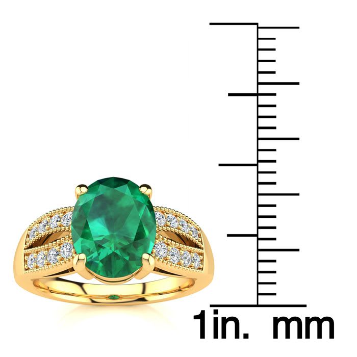 2 Carat Oval Shape Emerald and Diamond Ring In 14 Karat Yellow Gold