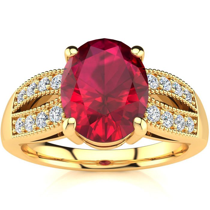 3 Carat Oval Shape Ruby and Diamond Ring In 14 Karat Yellow Gold