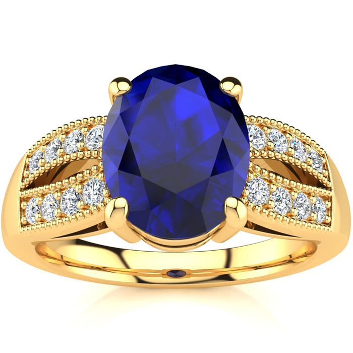 3 Carat Oval Shape Sapphire and Diamond Ring In 14 Karat Yellow Gold