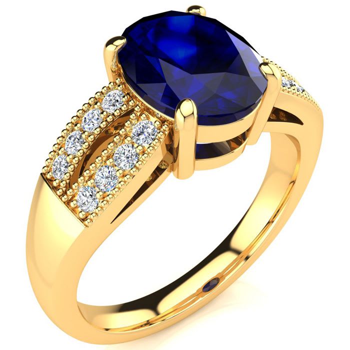 3 Carat Oval Shape Sapphire and Diamond Ring In 14 Karat Yellow Gold