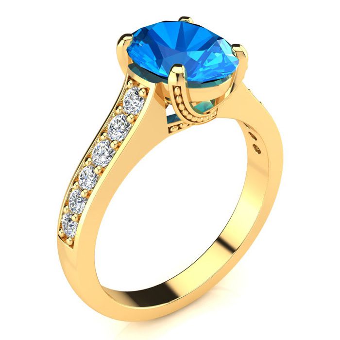 2 1/2 Carat Oval Shape Blue Topaz and Diamond Ring In 14 Karat Yellow Gold