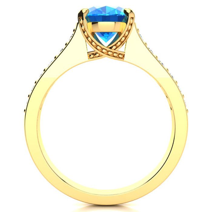 2 1/2 Carat Oval Shape Blue Topaz and Diamond Ring In 14 Karat Yellow Gold