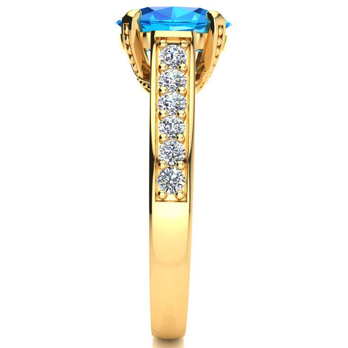 2 1/2 Carat Oval Shape Blue Topaz and Diamond Ring In 14 Karat Yellow Gold