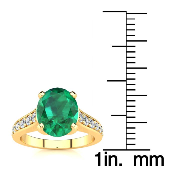 2 1/4 Carat Oval Shape Emerald and Diamond Ring In 14 Karat Yellow Gold