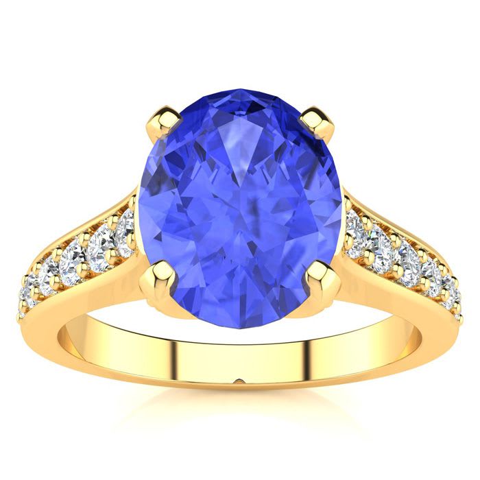 2 1/4 Carat Oval Shape Tanzanite and Diamond Ring In 14 Karat Yellow Gold