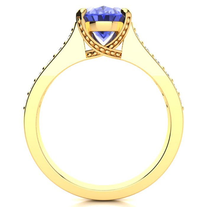 2 1/4 Carat Oval Shape Tanzanite and Diamond Ring In 14 Karat Yellow Gold