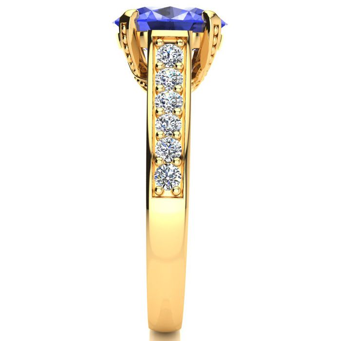 2 1/4 Carat Oval Shape Tanzanite and Diamond Ring In 14 Karat Yellow Gold