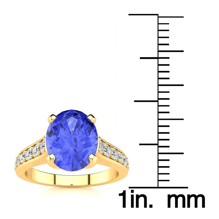 2 1/4 Carat Oval Shape Tanzanite and Diamond Ring In 14 Karat Yellow Gold