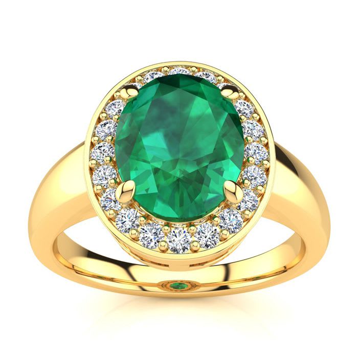 2 Carat Oval Shape Emerald and Halo Diamond Ring In 14 Karat Yellow Gold