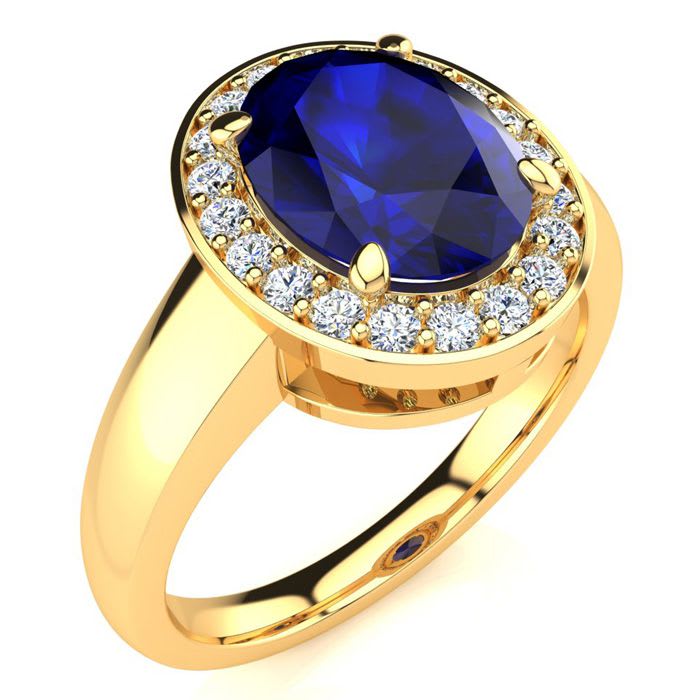 3 Carat Oval Shape Sapphire and Halo Diamond Ring In 14 Karat Yellow Gold