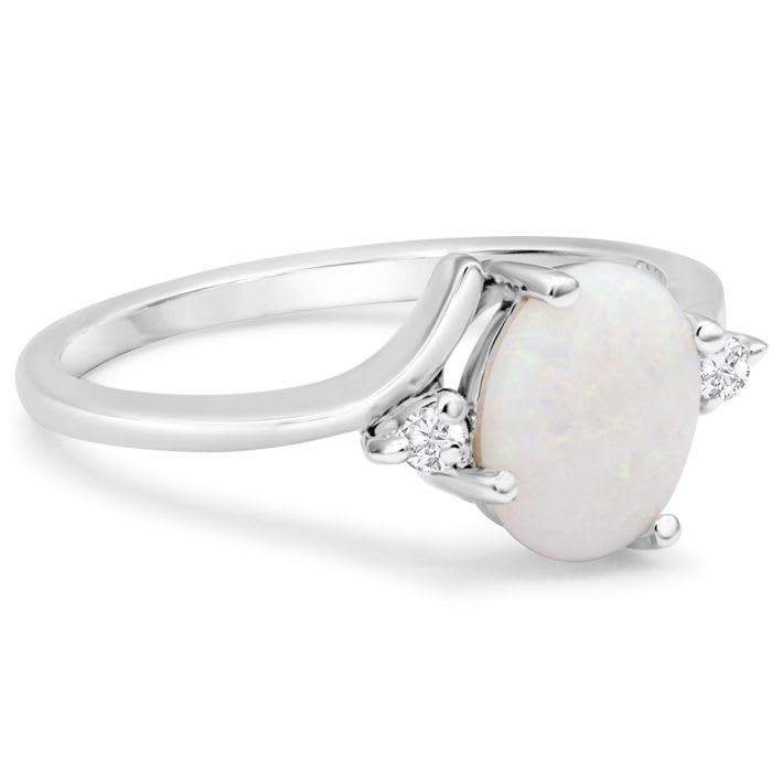 7/8 Carat Opal Ring and Two Diamonds In 14 Karat White Gold