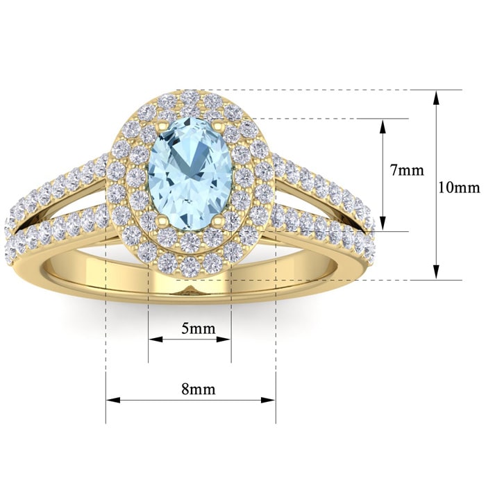 Aquamarine Ring: Aquamarine Jewelry: 1 3/4 Carat Oval Shape Aquamarine and Halo Diamond Ring In 14 Karat Yellow Gold