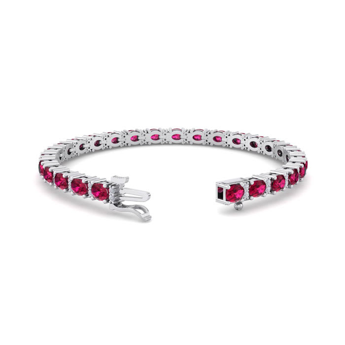 Ruby Bracelet; Ruby Tennis Bracelet; 7 Carat Oval Shape Ruby and Diamond Bracelet In 14 Karat White Gold