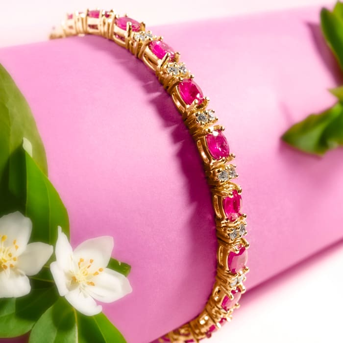 Ruby Bracelet; Ruby Tennis Bracelet; 7 Carat Oval Shape Ruby and Diamond Bracelet In 14 Karat Yellow Gold