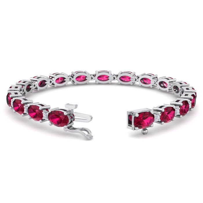 Ruby Bracelet; Ruby Tennis Bracelet; 11 Carat Oval Shape Ruby and Diamond Bracelet In 14 Karat White Gold