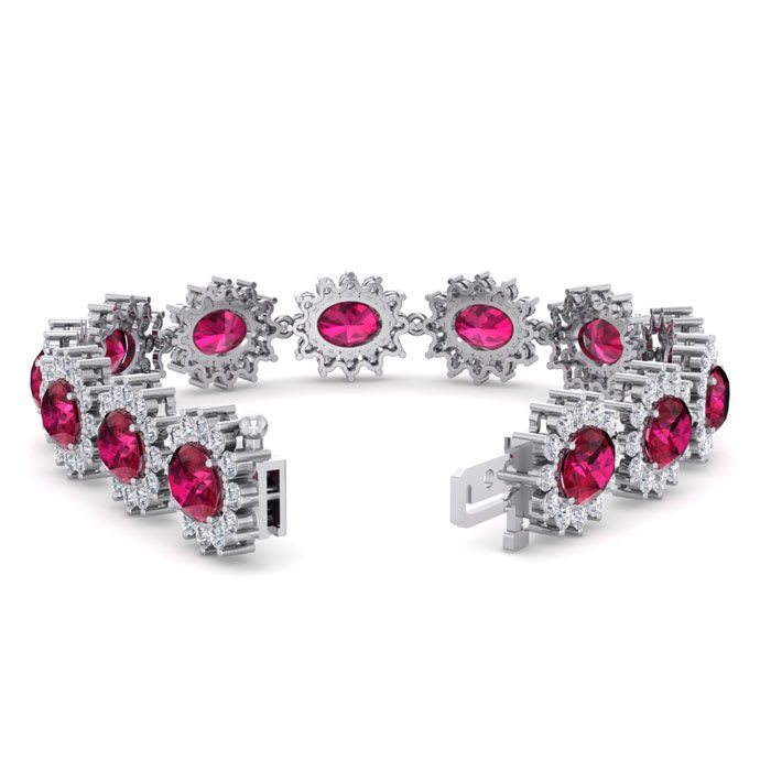Ruby Bracelet; Ruby Tennis Bracelet; 25 Carat Oval Shape Ruby and Halo Diamond Bracelet In 14 Karat White Gold