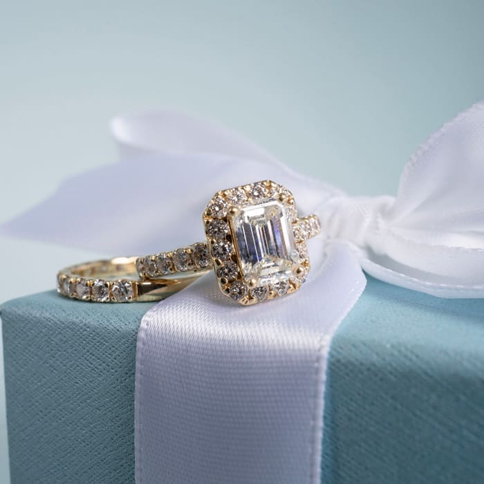 3 Carat Emerald Cut Halo Diamond Bridal Set In 14 Karat Yellow Gold