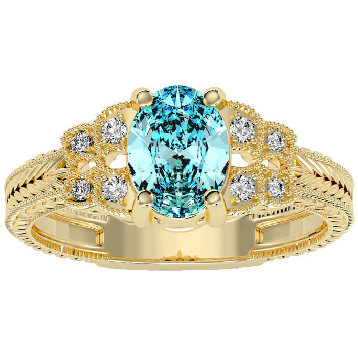 Aquamarine Ring: Aquamarine Jewelry: 1 1/4 Carat Oval Shape Aquamarine and Diamond Ring In 10 Karat Yellow Gold