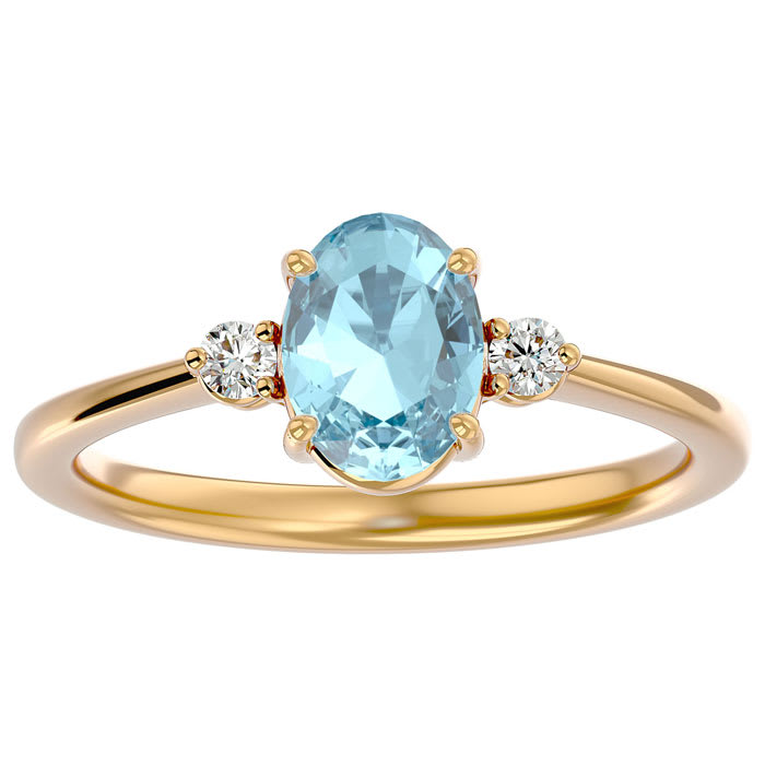 Aquamarine Ring: Aquamarine Jewelry: 1 1/4 Carat Oval Shape Aquamarine and Two Diamond Ring In 14 Karat Yellow Gold