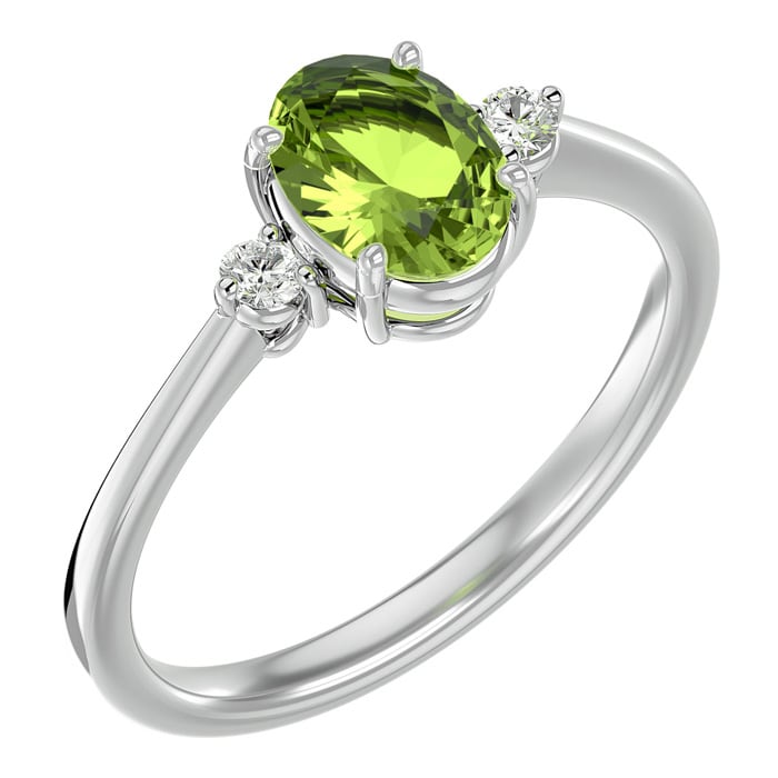1 1/2 Carat Oval Shape Peridot and Two Diamond Ring In 14 Karat White Gold