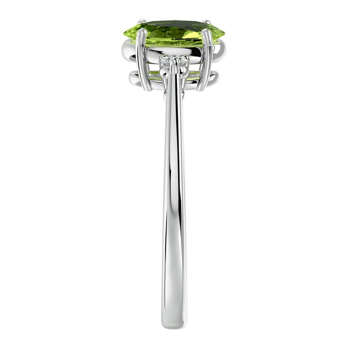 1 1/2 Carat Oval Shape Peridot and Two Diamond Ring In 14 Karat White Gold