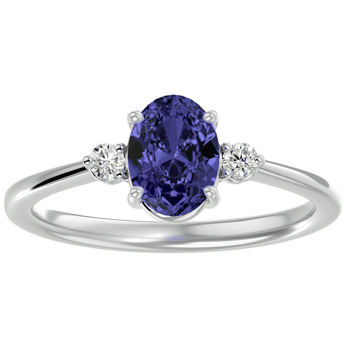 1 1/2 Carat Oval Shape Tanzanite and Two Diamond Ring In 14 Karat White Gold