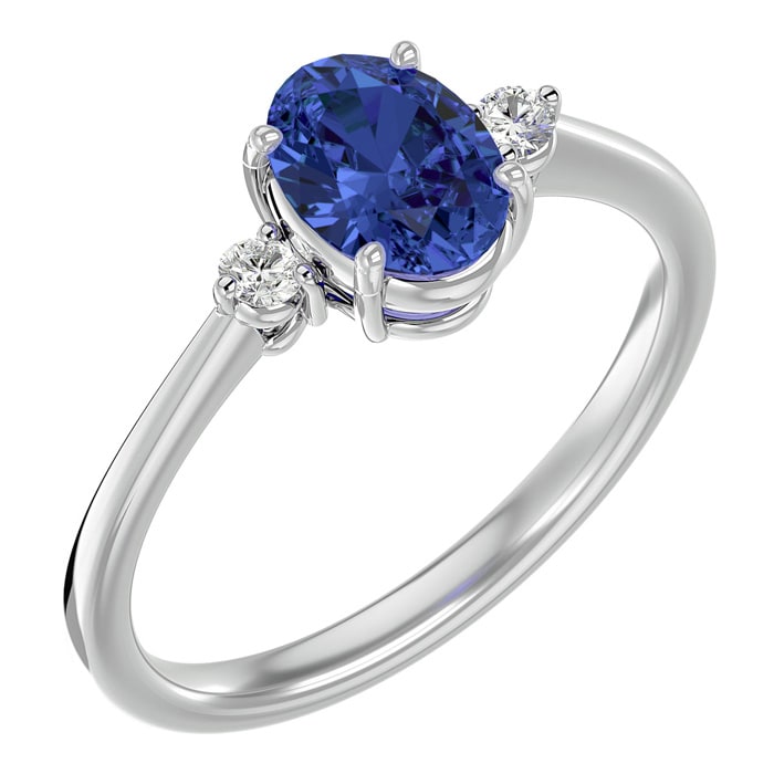 1 1/2 Carat Oval Shape Tanzanite and Two Diamond Ring In 14 Karat White Gold