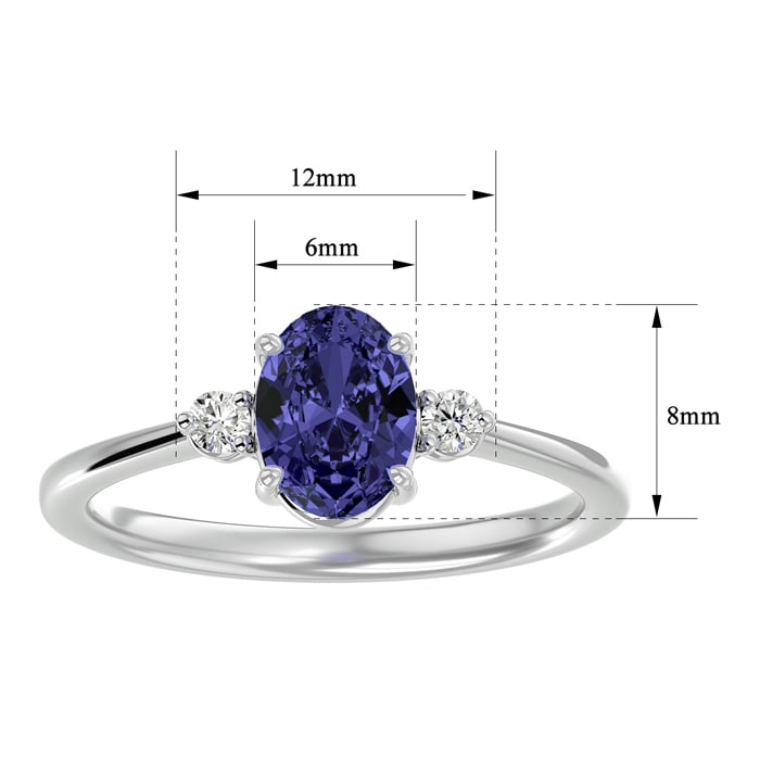 1 1/2 Carat Oval Shape Tanzanite and Two Diamond Ring In 14 Karat White Gold