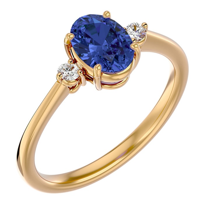 1 1/2 Carat Oval Shape Tanzanite and Two Diamond Ring In 14 Karat Yellow Gold