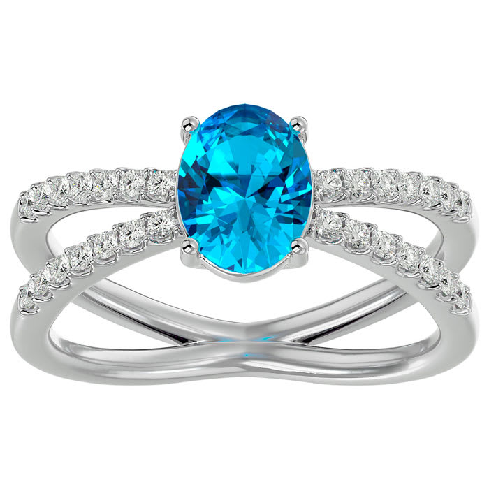 1 3/4 Carat Oval Shape Blue Topaz and Diamond Ring In 14 Karat White Gold