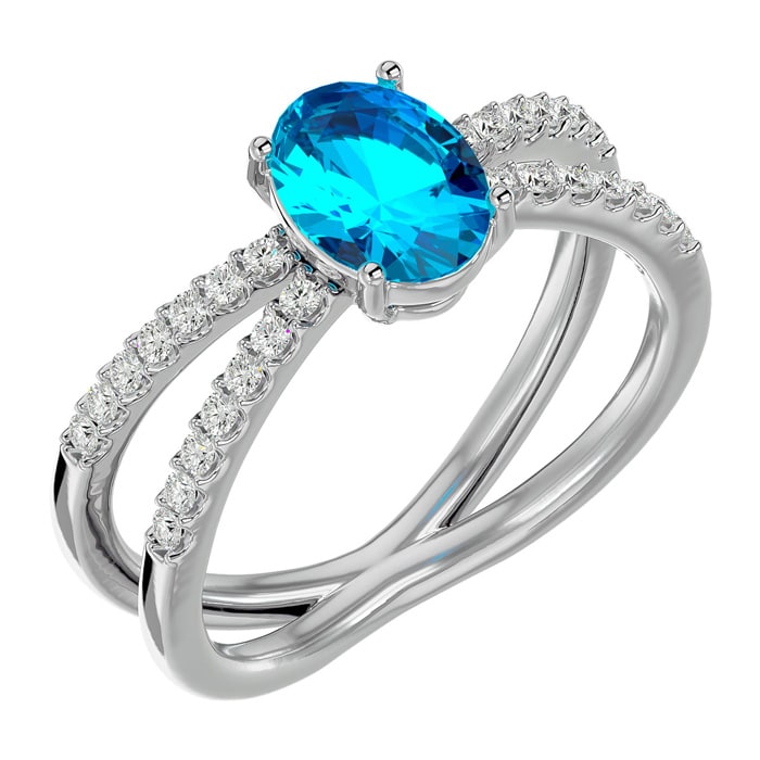 1 3/4 Carat Oval Shape Blue Topaz and Diamond Ring In 14 Karat White Gold