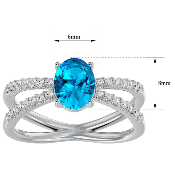 1 3/4 Carat Oval Shape Blue Topaz and Diamond Ring In 14 Karat White Gold