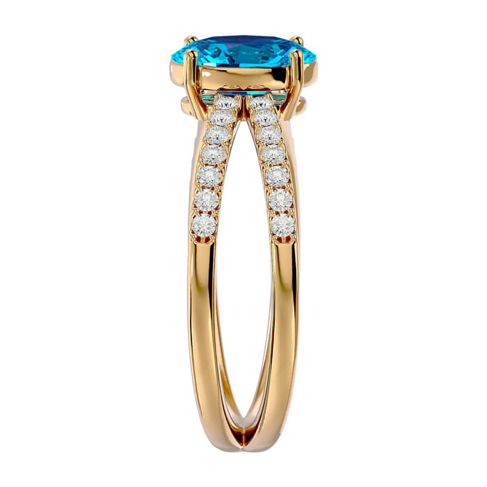 1 3/4 Carat Oval Shape Blue Topaz and Diamond Ring In 14 Karat Yellow Gold