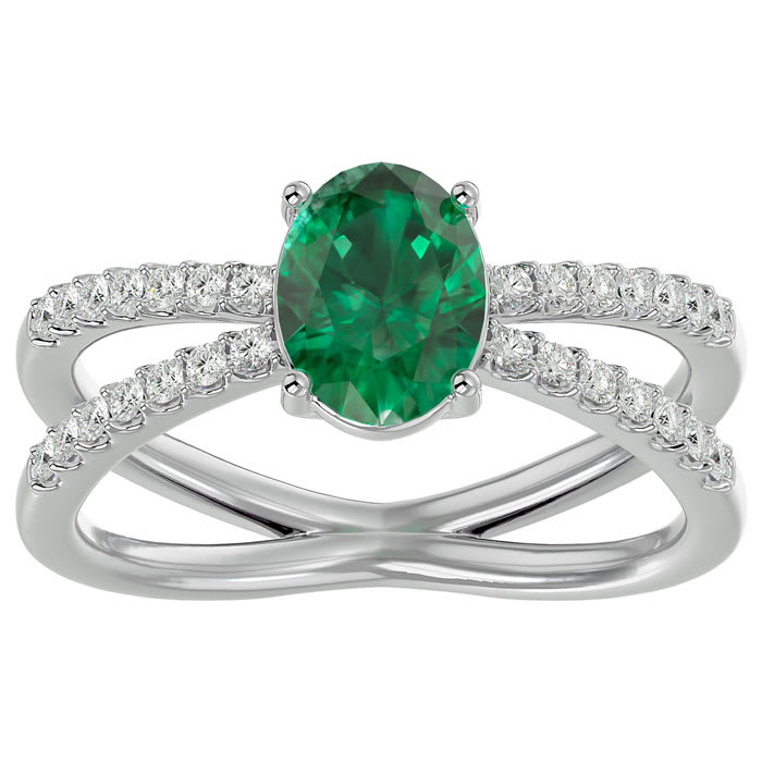 1.40 Carat Oval Shape Emerald and Diamond Ring In 14 Karat White Gold