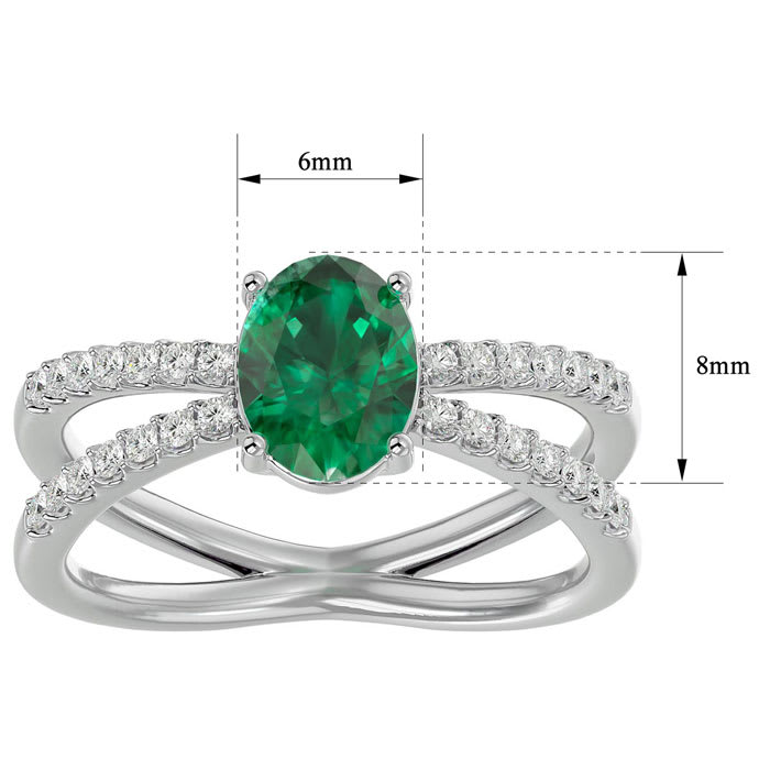 1.40 Carat Oval Shape Emerald and Diamond Ring In 14 Karat White Gold