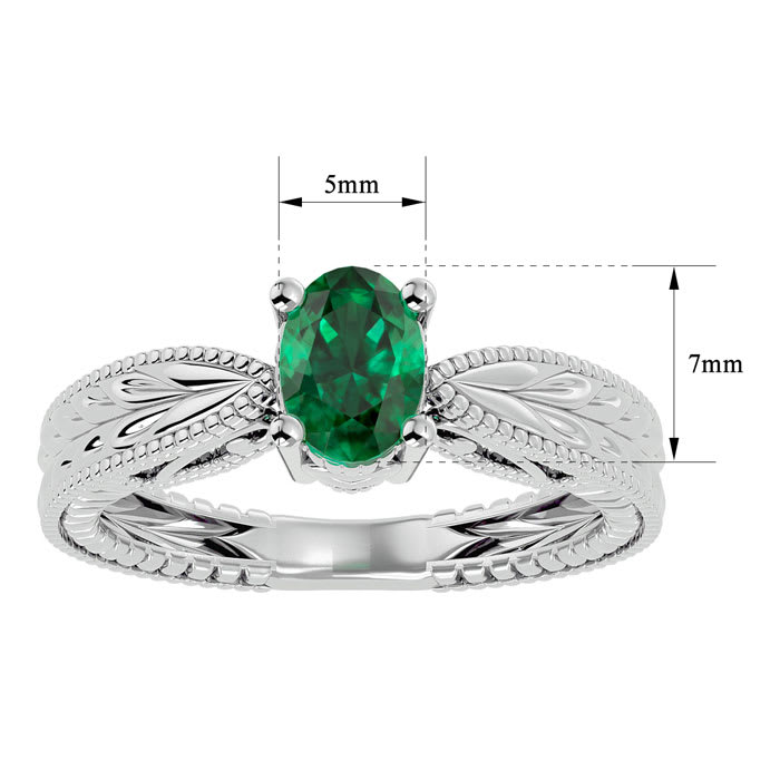 3/4 Carat Oval Shape Emerald Ring With Tapered Etched Band In 14 Karat White Gold
