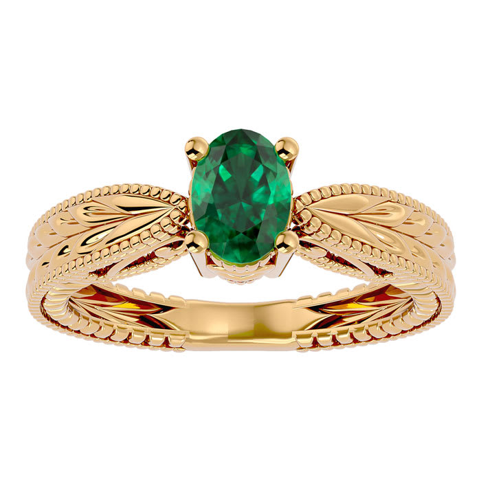 3/4 Carat Oval Shape Emerald Ring With Tapered Etched Band In 14 Karat Yellow Gold