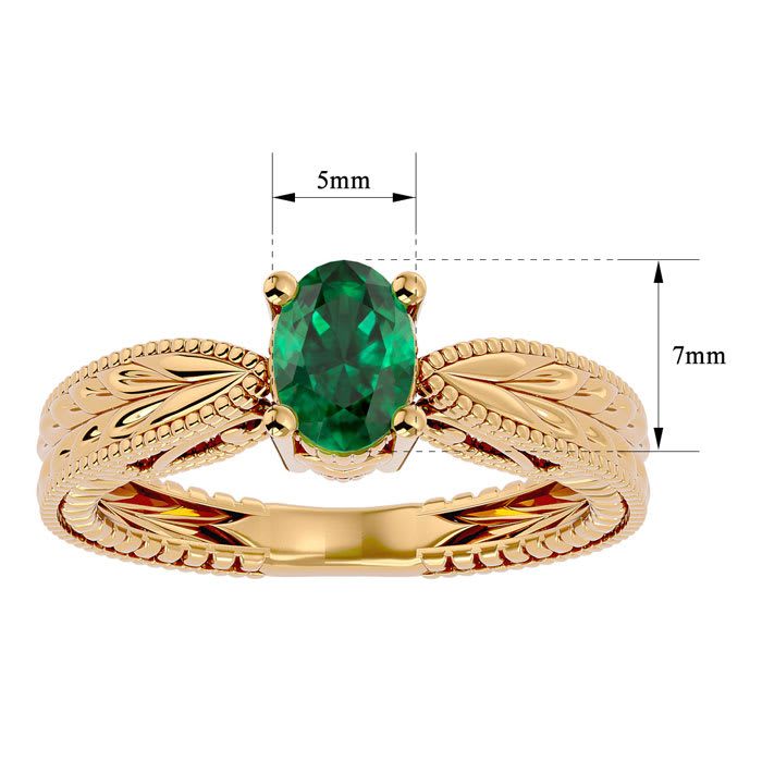 3/4 Carat Oval Shape Emerald Ring With Tapered Etched Band In 14 Karat Yellow Gold