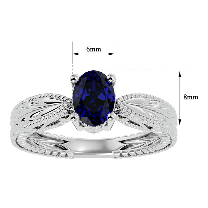 1 1/2 Carat Oval Shape Sapphire Ring With Tapered Etched Band In 14 Karat White Gold