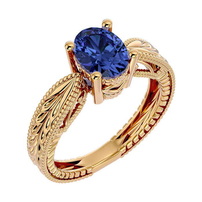 2 Carat Oval Shape Tanzanite Ring With Tapered Etched Band In 14 Karat Yellow Gold