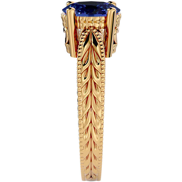 2 Carat Oval Shape Tanzanite Ring With Tapered Etched Band In 14 Karat Yellow Gold