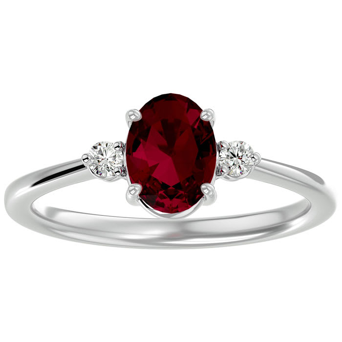 Ruby Ring: 1 1/3 Carat Oval Shape Created Ruby and Two Diamond Ring In Sterling Silver