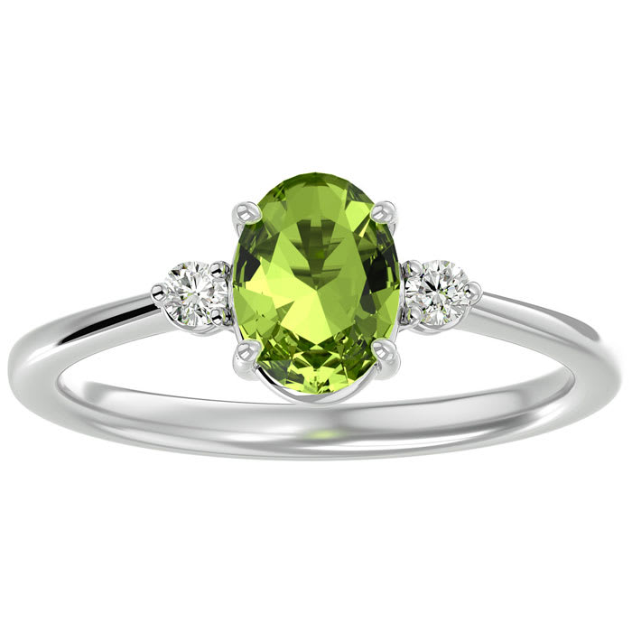 Peridot Ring: 1 1/3 Carat Oval Shape Peridot and Two Diamond Ring In Sterling Silver