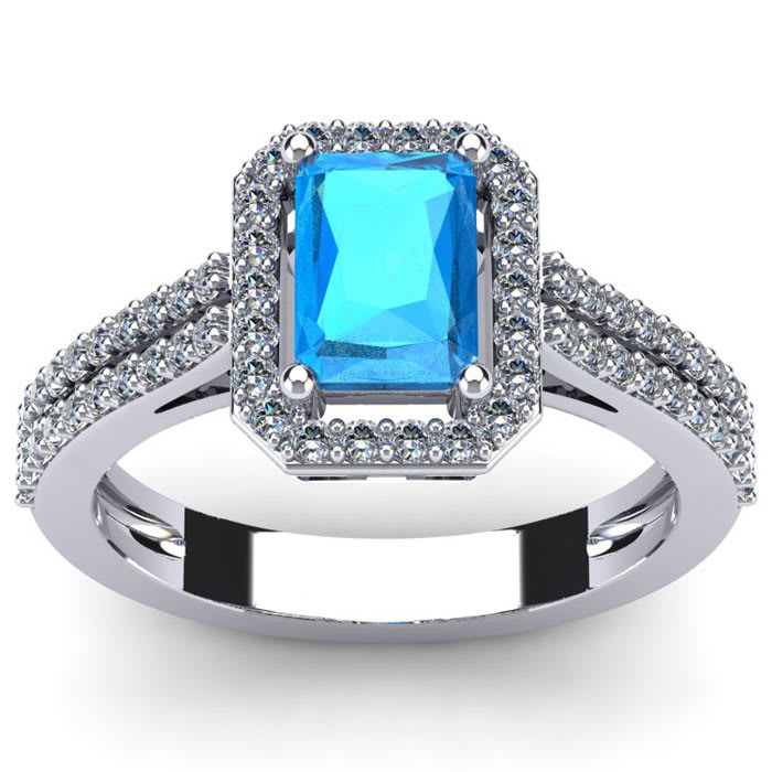 Blue Topaz Ring: 1 1/2 Carat Octagon Shape Blue Topaz and Halo Diamond Ring In Sterling Silver